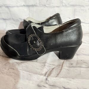 Buckle black shoes